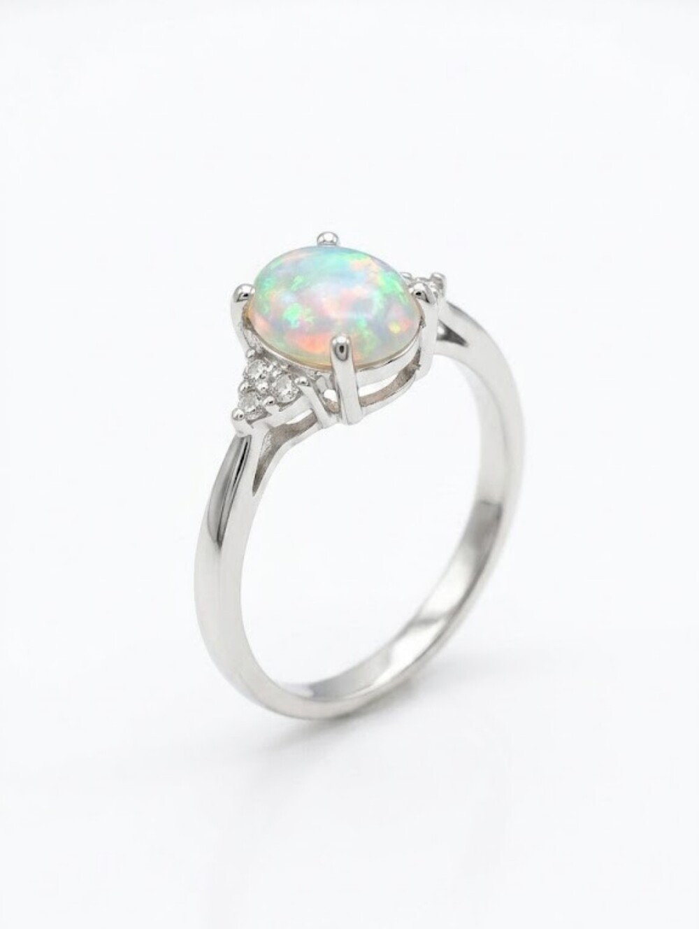 Silver-plated Oval Fire Opal Ring with CZ Accents